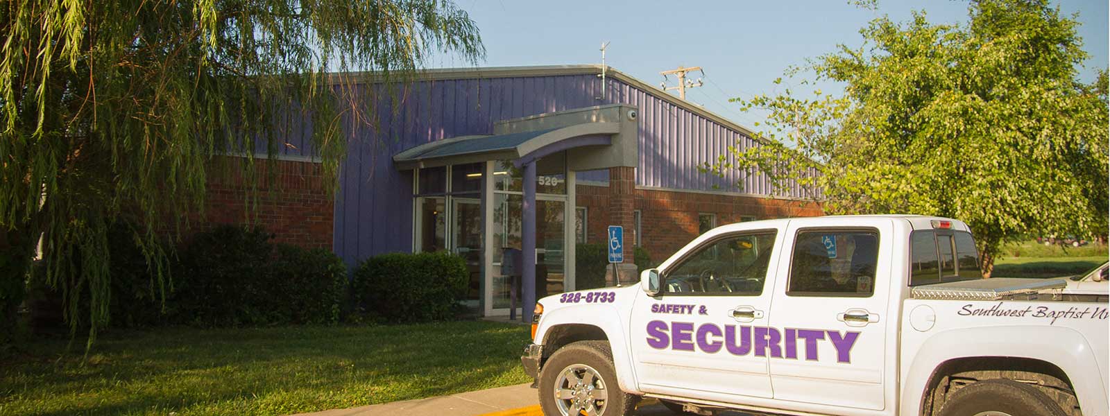 security truck in front of physical plant building