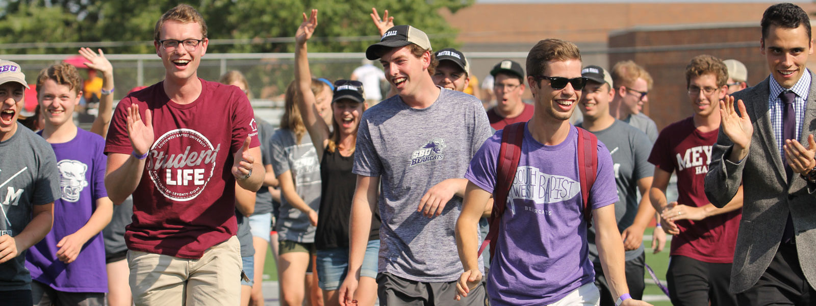 students participating in Homecoming bed races