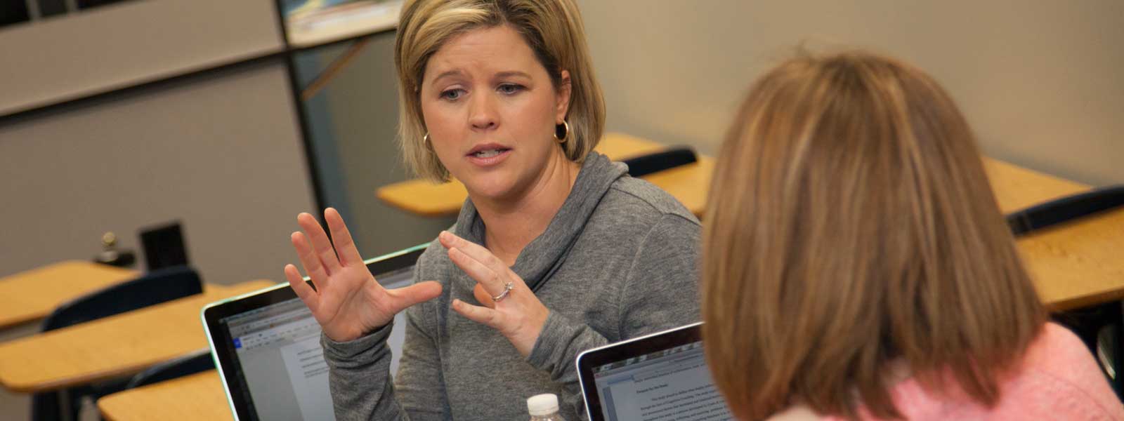 students in discussion in classroom